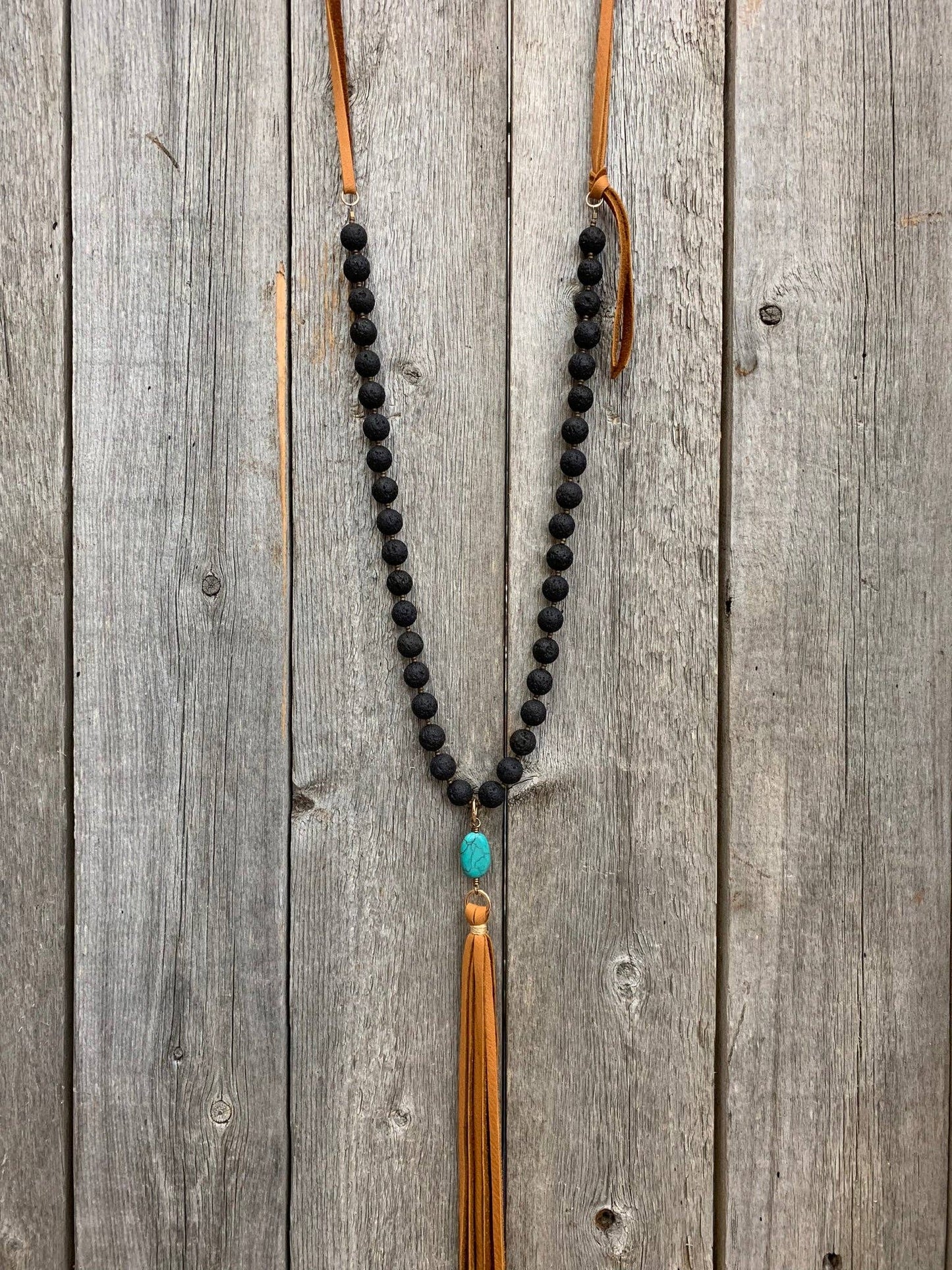 Lava Rock with Turquoise and Leather Tassel